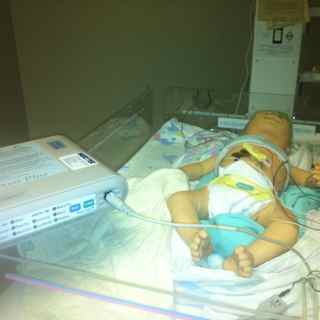 Infant respiratory simulator with home monitor system
