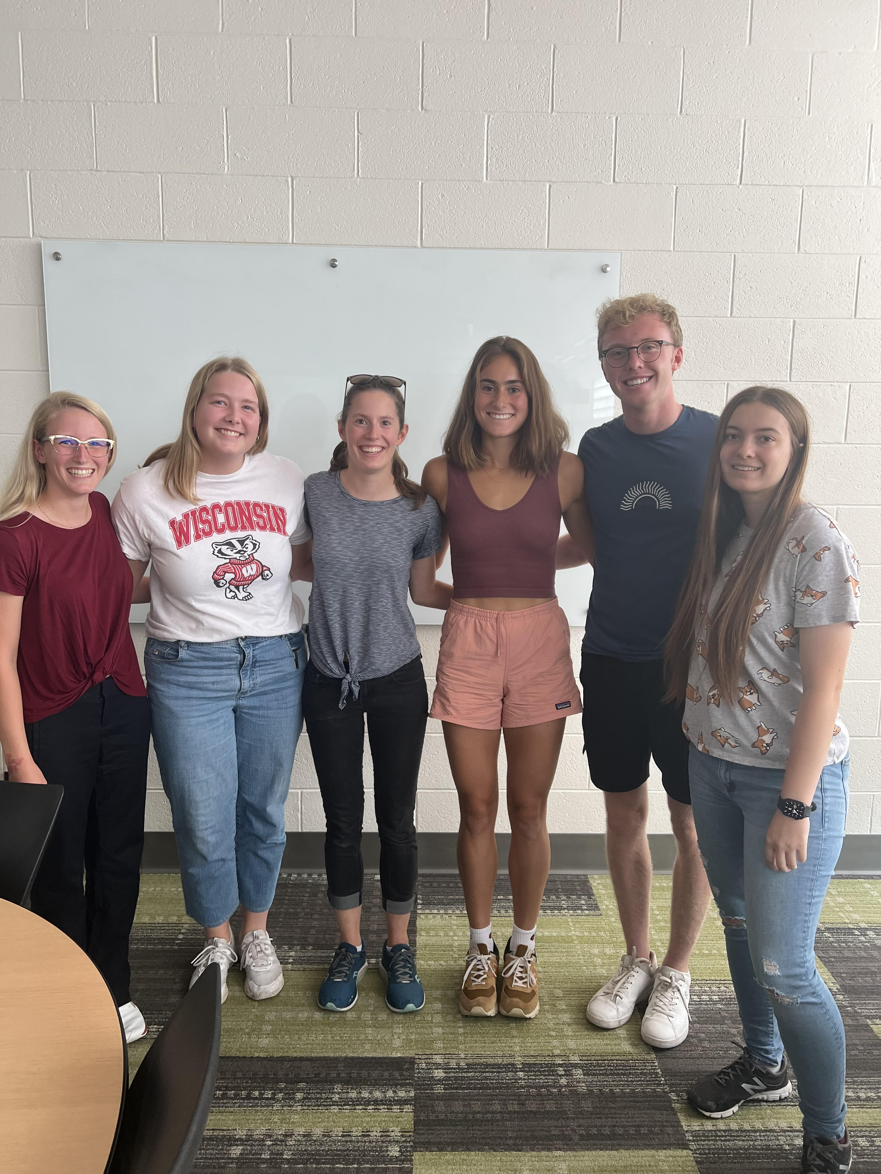 A Photo of the members working on the project. From left to right: Cora (Communicator) , Maggie (BPAG) , Molly (BSAC) , Lauren (Leader), Zach (Leader), Emily (BWIG).