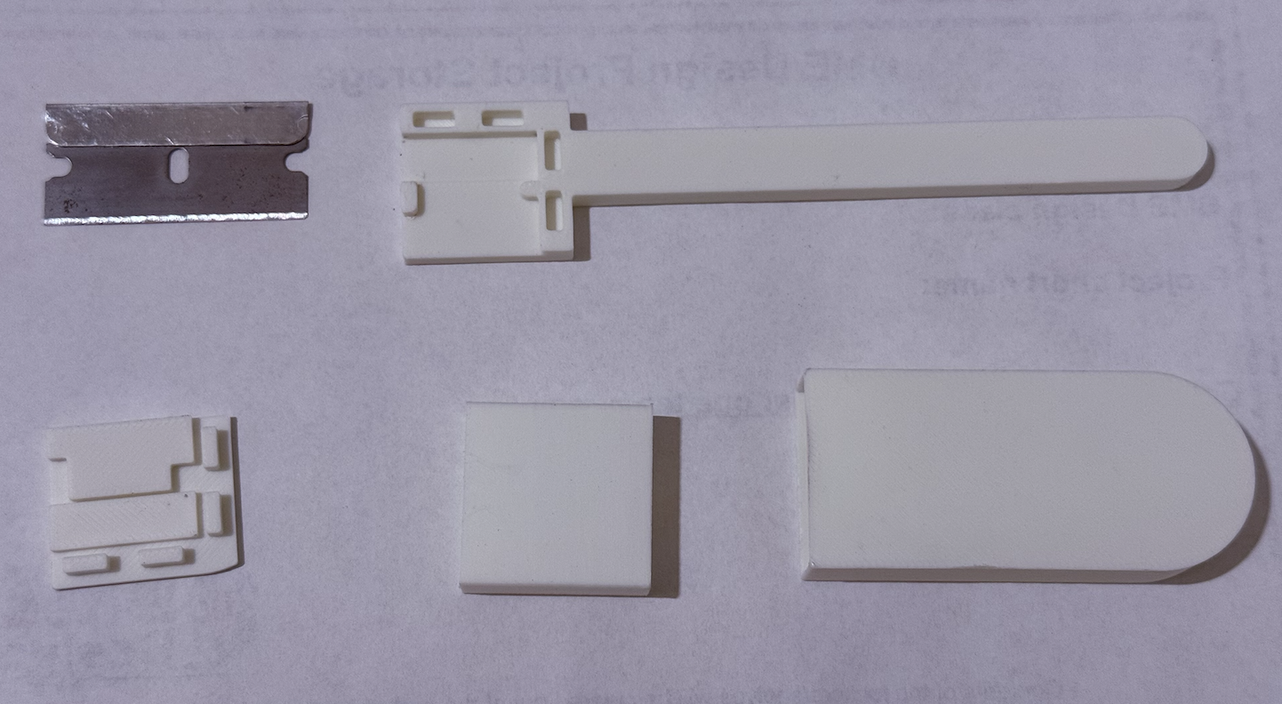 Blade Handle component (in alignment with 'razor blade')