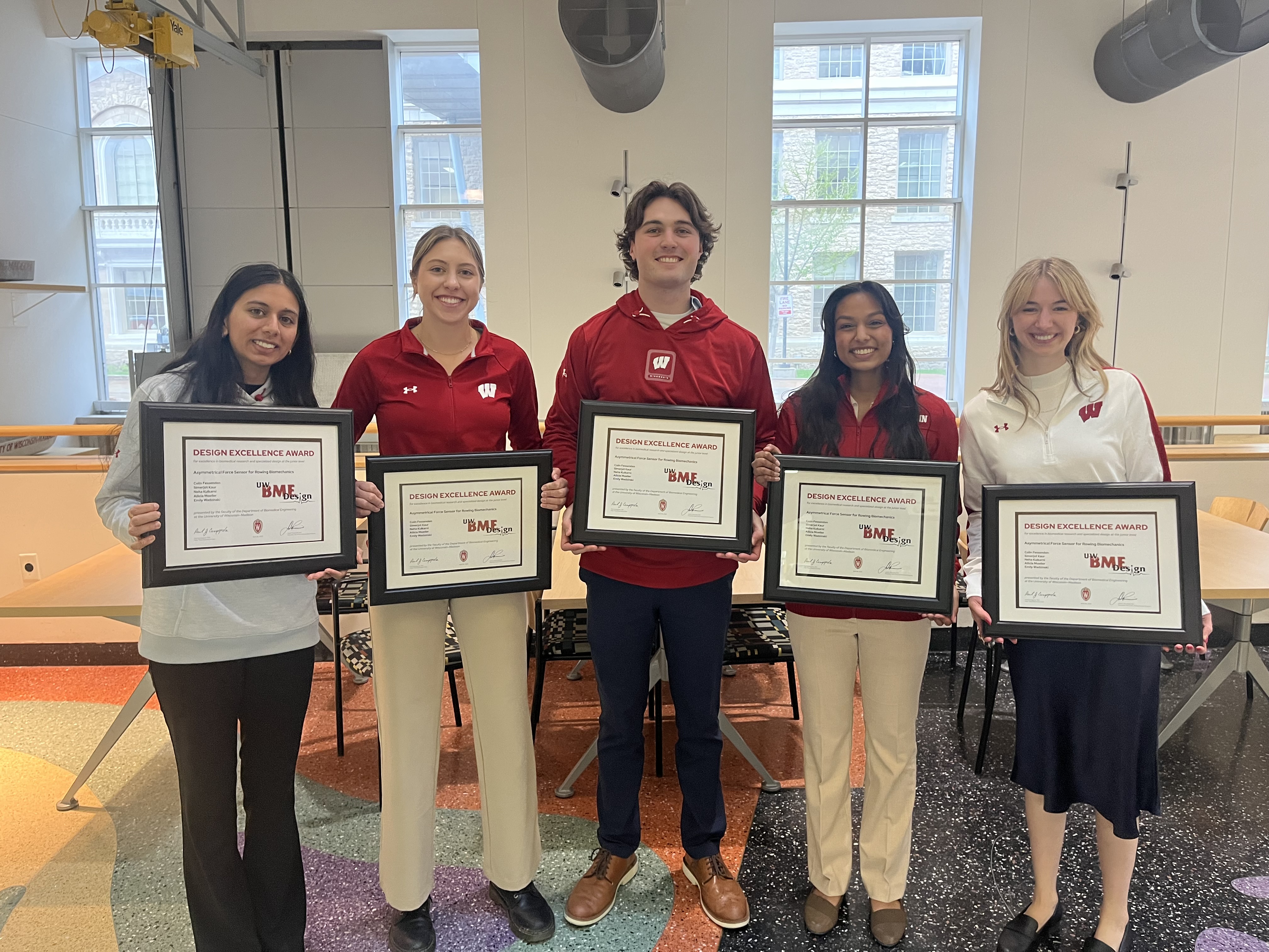 From left: Simerjot Kaur, Emily Wadzinski, Colin Fessenden, Neha Kulkarni, Allicia Moeller with BME Design Excellence Awards.