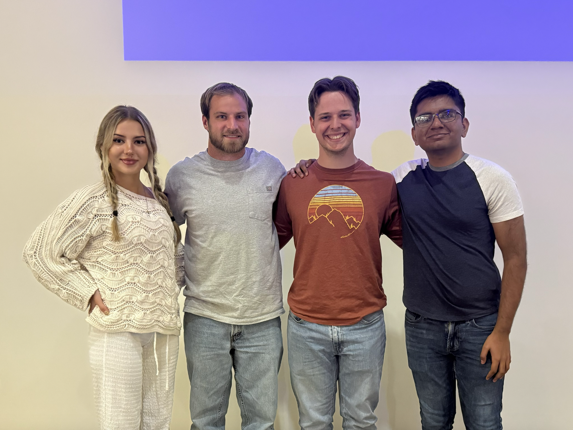 Team photo; from left to right: Tatiana Predko (BWIG and Co-BPAG), Joseph Koch (BSAC), Keleous Lange (Communicator and Co-BPAG), and Roshan Patel (Team Leader).